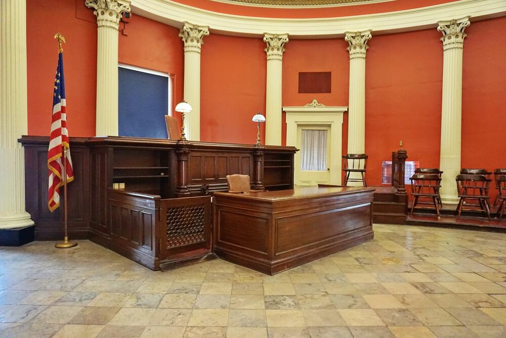 court room in lawsuit against rental property LLC