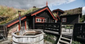 HELOC on rental property black and red house with bridge and hot tub